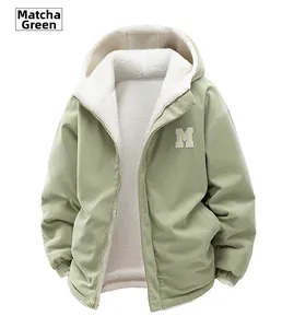 Detail of matcha green corduroy jacket with thick white fleece lining and M patch