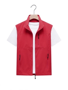Red outdoor utility vest with standing collar and multiple zipper pockets for men