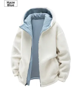 Detail of haze blue fleece hood lining and thick white lamb wool textured fabric