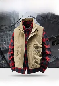 Detail view of a khaki outdoor fishing waistcoat paired with a red checkered flannel shirt