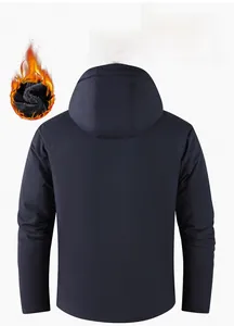 Detail of waterproof outdoor jacket featuring a warm thick black fleece lining and hood