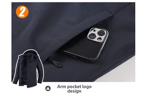 Detailed close-up of a zippered arm pocket on a waterproof outdoor jacket for large storage