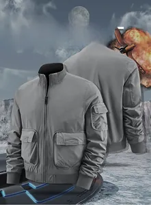 Detail view of grey bomber jacket with utility pockets, ribbed cuffs and stand collar