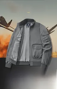Detail showing windproof grey bomber jacket with tactical sleeve pocket and ribbed cuffs