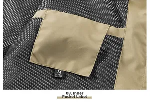 Detail shot of the inner pocket lining with mesh fabric and size label on vest