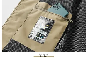 Detail of khaki outdoor vest showing breathable mesh lining and a secure zipper inner pocket