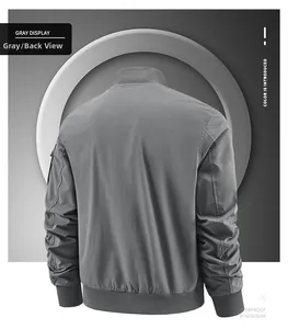 Rear view of grey bomber jacket with waterproof fabric and utility zipper pocket