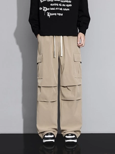 Men's khaki loose straight cargo pants with multiple pockets and white drawstring waist
