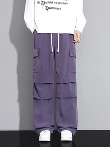 Men's purple cargo pants with loose wide-leg fit and multiple utility pockets
