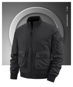 Detail view of black tactical jacket showing waterproof fabric and utility pockets