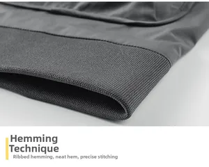 Close-up of gray bomber jacket ribbed hem with high-quality stitching detail