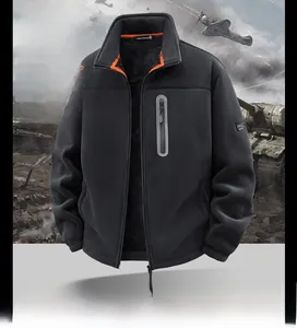 Detailed view of warm double-sided fleece jacket with orange neck lining and zip pocket