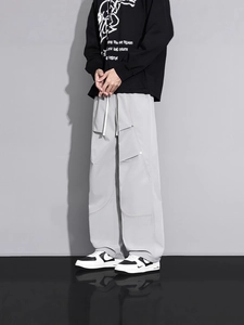 Pantalon parachute cargo gris clair ample pour hommes avec poches et cordon de serrage