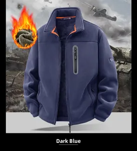 Detail of warm double-sided fleece jacket in dark blue with zip pocket and arm patch