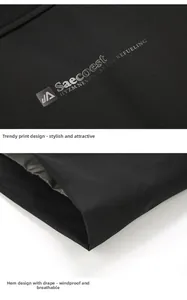 Detail of the high-quality black windproof jacket fabric with printed logo and neat hemline
