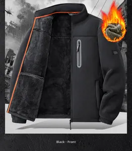 Detail of black fleece jacket showing thick grey sherpa lining and orange trim accents
