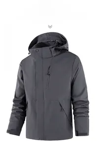Detail of mica grey outdoor jacket featuring windproof zipper and adjustable velcro cuffs