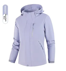 Detail of female waterproof outdoor jacket in moonlight orchid with hood and zip pockets
