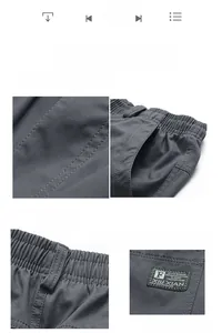 Détail du pantalon gris foncé pour hommes avec taille élastique, passants et tissu sergé