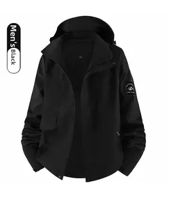 Close-up of black men's waterproof windbreaker with hood and arm badge detail