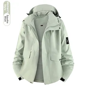 Detail of smoke blue waterproof jacket featuring hooded design and breathable mesh lining