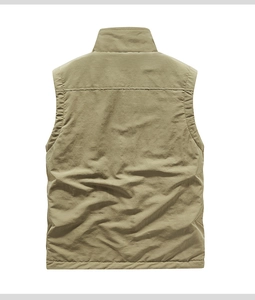 Back view of men's khaki outdoor vest showing horizontal stitching and durable fabric