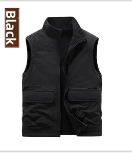 Close-up of black outdoor vest featuring functional flap pockets and durable zipper closure