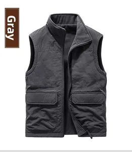 Detail of grey outdoor vest showing windproof fabric and large utility pockets