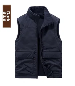 Detail of dark blue outdoor vest showing windproof fabric, fleece lining and cargo pockets