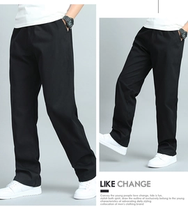 Détail du pantalon noir pour hommes avec taille élastique et tissu en sergé de coton