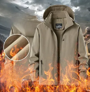 Close-up of winter fleece lining and waterproof khaki fabric on a warm outdoor jacket