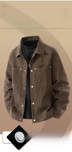 Detail of a brown American retro casual jacket showing wavy fabric texture and large chest pocket