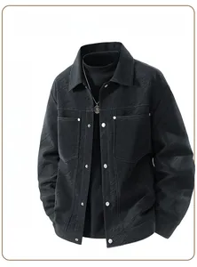 Detailed view of black men's jacket featuring unique wood grain texture and flap pockets