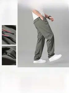 Détail du pantalon en coton vert armée pour homme avec cordon et poche latérale zippée