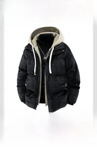 Detail view of black corduroy puffer jacket showing layered hood and metal zipper texture