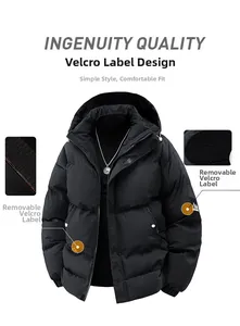 Detail view of winter jacket featuring removable velcro patches and windproof ribbed cuffs
