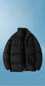 Close-up of men's black padded jacket featuring windproof stand collar and quilted design