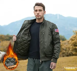 Detail of army green flight jacket showing quilted lining and American flag patch
