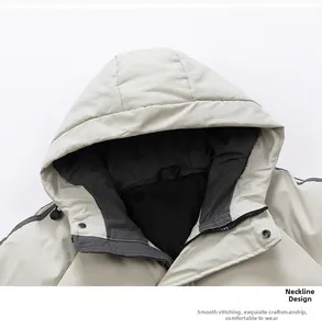 Detail of men's hooded jacket neckline showing zipper, metal snap and fine stitching