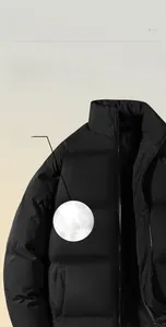 Detailed view of the insulated inner lining and high-quality zipper of the black winter jacket
