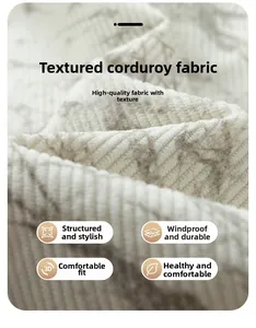Gros plan sur la texture du velours côtelé avec motif marbré gris sur la veste chaude