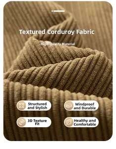 Macro shot of brown corduroy fabric texture showing vertical ridges and thick thermal material