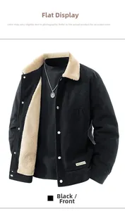 Detail of black corduroy jacket with beige sherpa lining and metal buttons