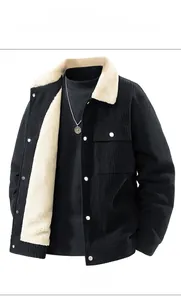 Front view of black corduroy jacket with beige faux fur lining and large chest pockets
