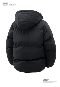 Rear view detail of black hooded winter jacket with horizontal quilted stitching design
