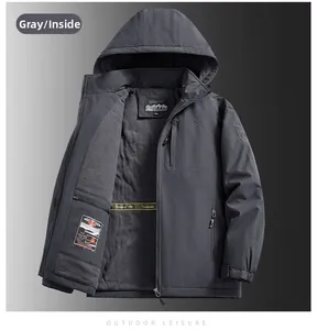 Detail of dark grey outdoor jacket with thick grey fleece lining and zipper pockets
