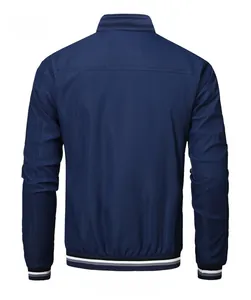 Back view of men's navy blue bomber jacket featuring striped ribbed cuffs and hem