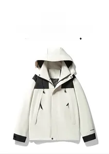 Detail of outdoor windbreaker jacket featuring zipper pockets and adjustable velcro cuffs