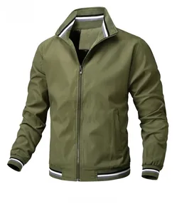 Detail of green men's jacket with striped ribbed collar and windproof fabric texture