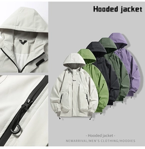 Detail view of waterproof zippers and drawstring hem on outdoor hooded jackets